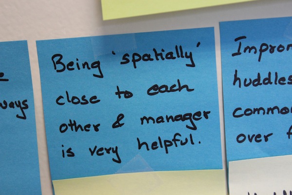 A post it note showing need for spatial colocation